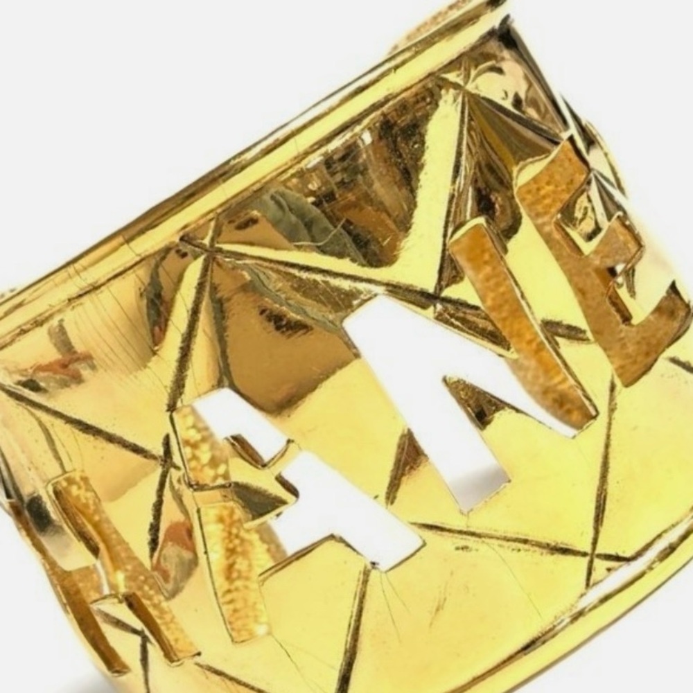 CHANEL Gold Textured Piece